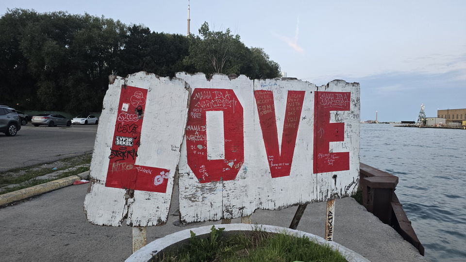 The LOVE public art installation at the east end of the quay, painted white concrete with tall red letters